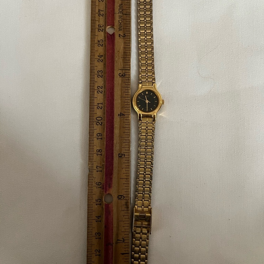 Gold and Black seiko Wristwatch